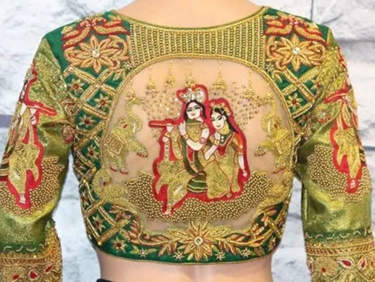 Bride wearing a heavily embroidered pink and gold blouse